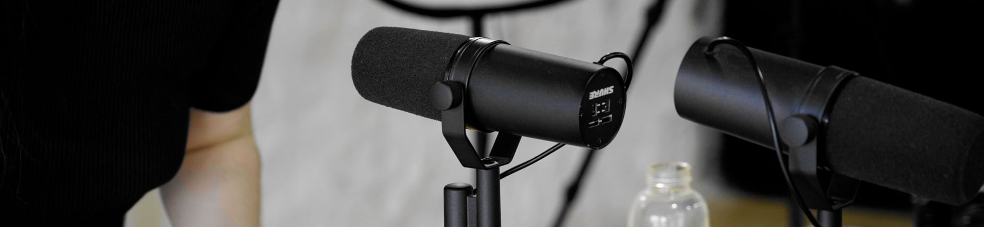 Microphones being set up for a podcast