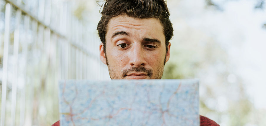 Man analyzing map