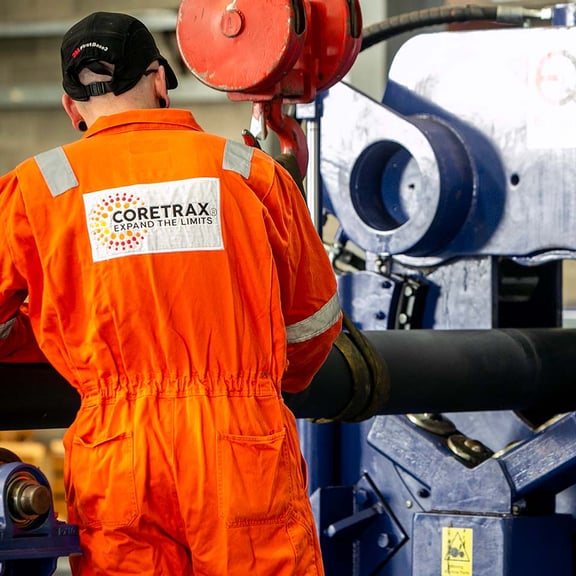 Coretrax worker at machinery