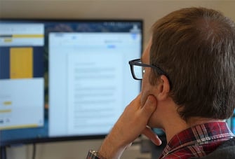 Web Developers Looking At Computer Screen