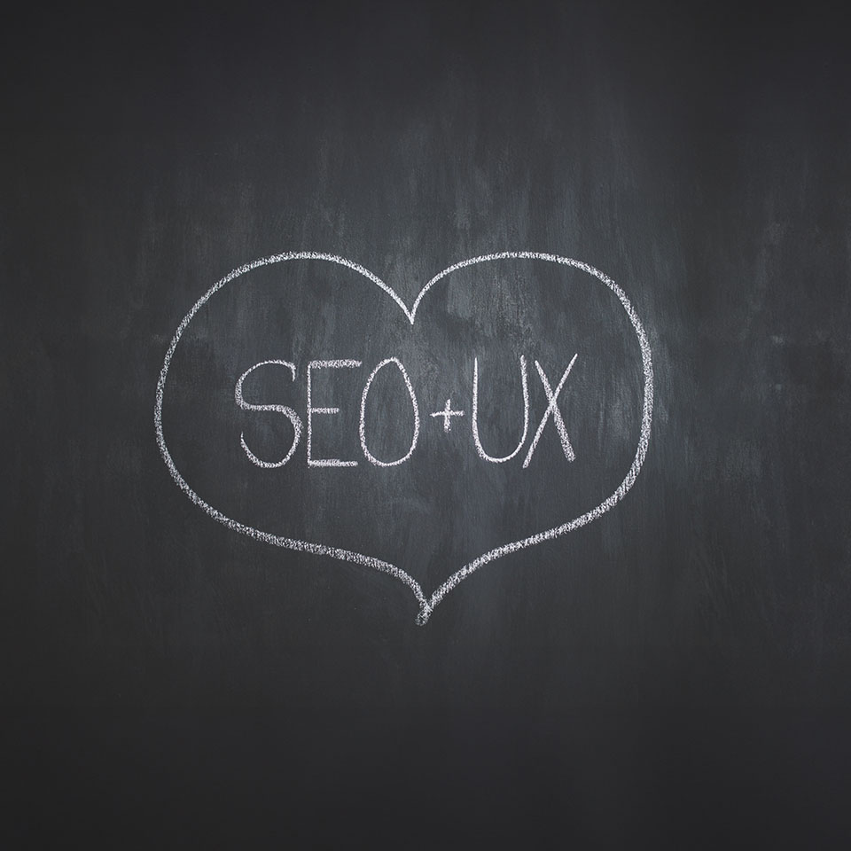 seo and ux written in chalk on a blackboard