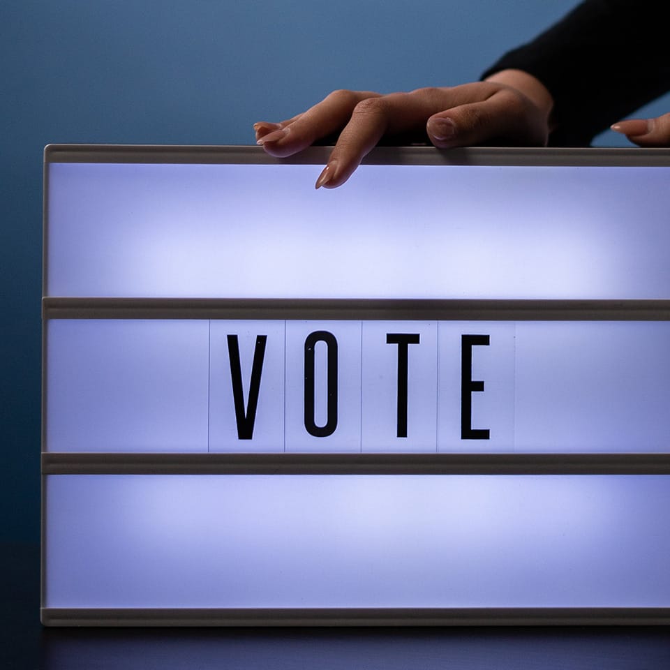 Vote sign on light box