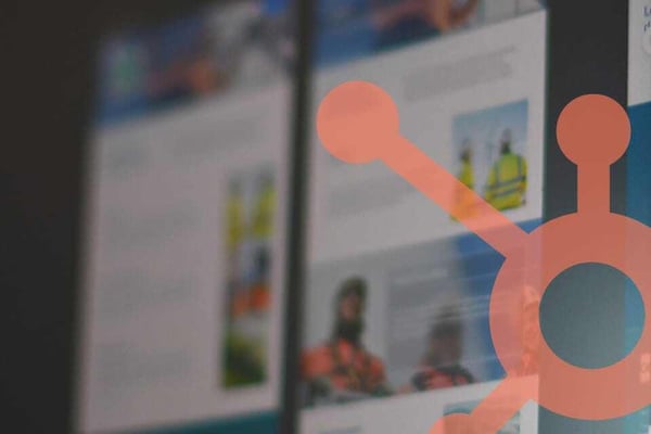 Blurred website design background with Hubspot logo in front
