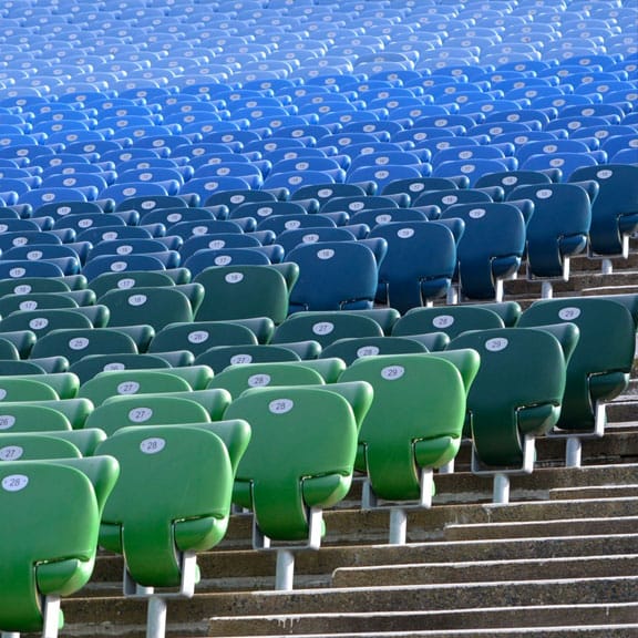 Blue and Green seats in a stadium