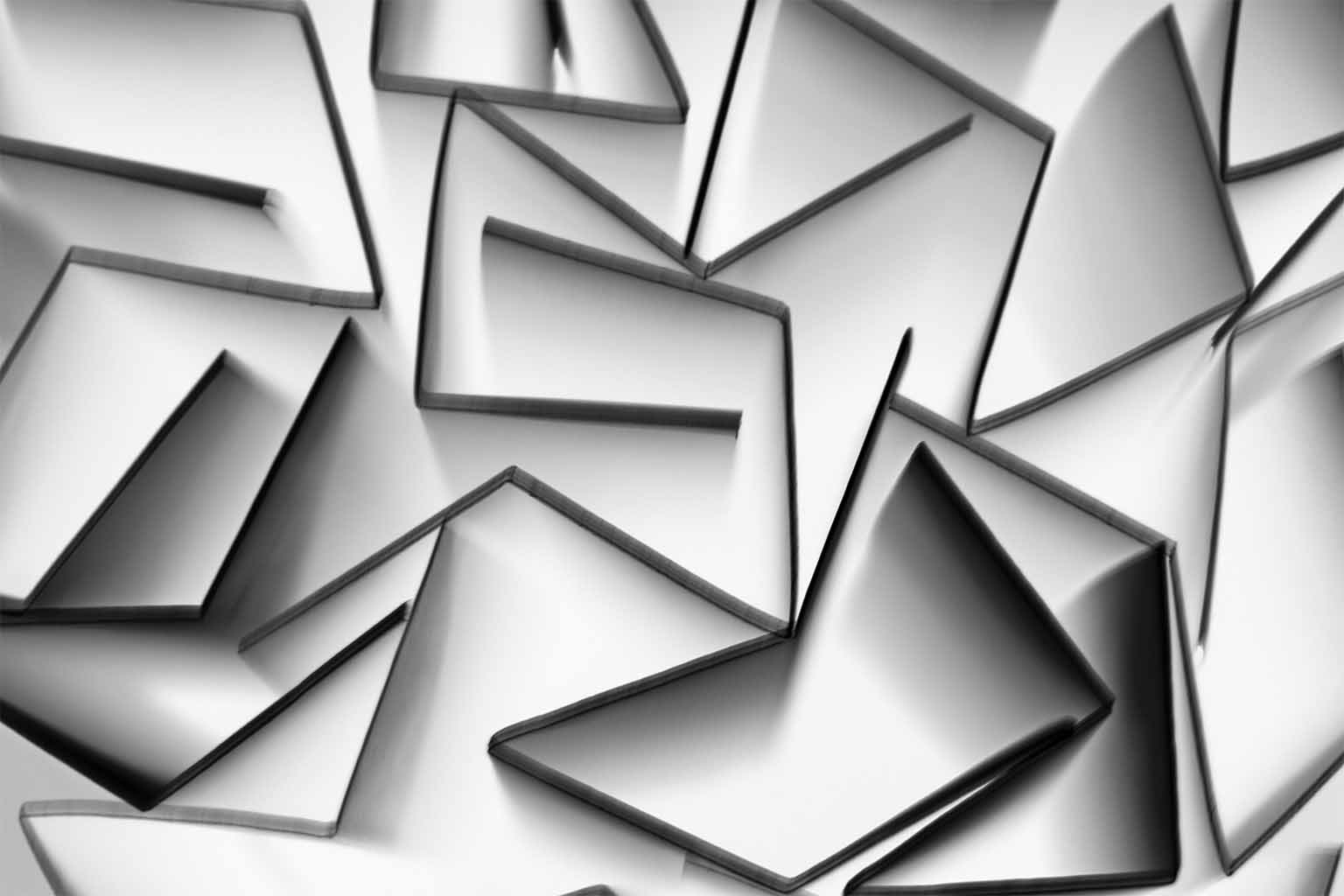 Image of an abstract support network made of graphite grey lines over a white background.