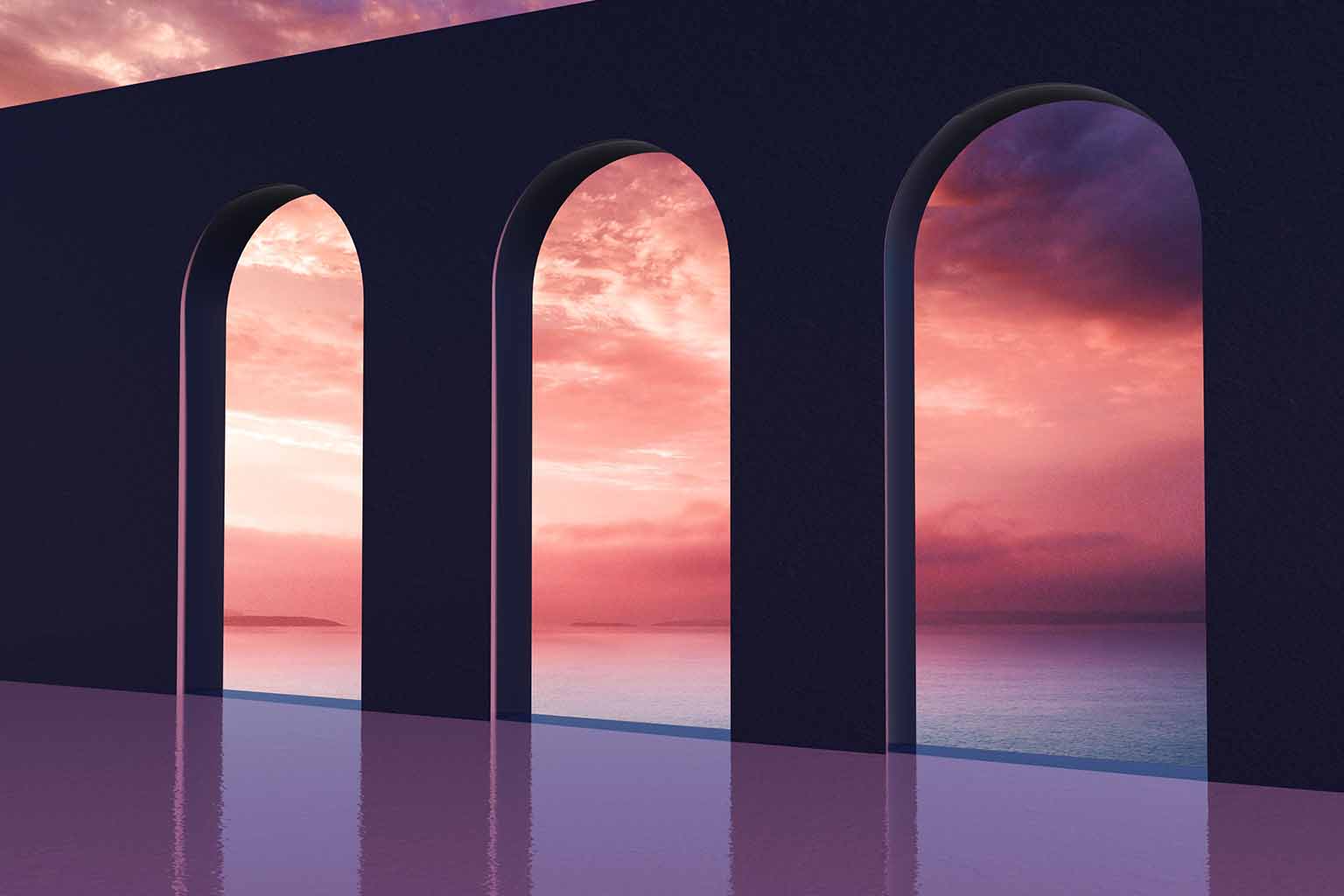 Three archways with a quiet sea bathed in sunset light in the background