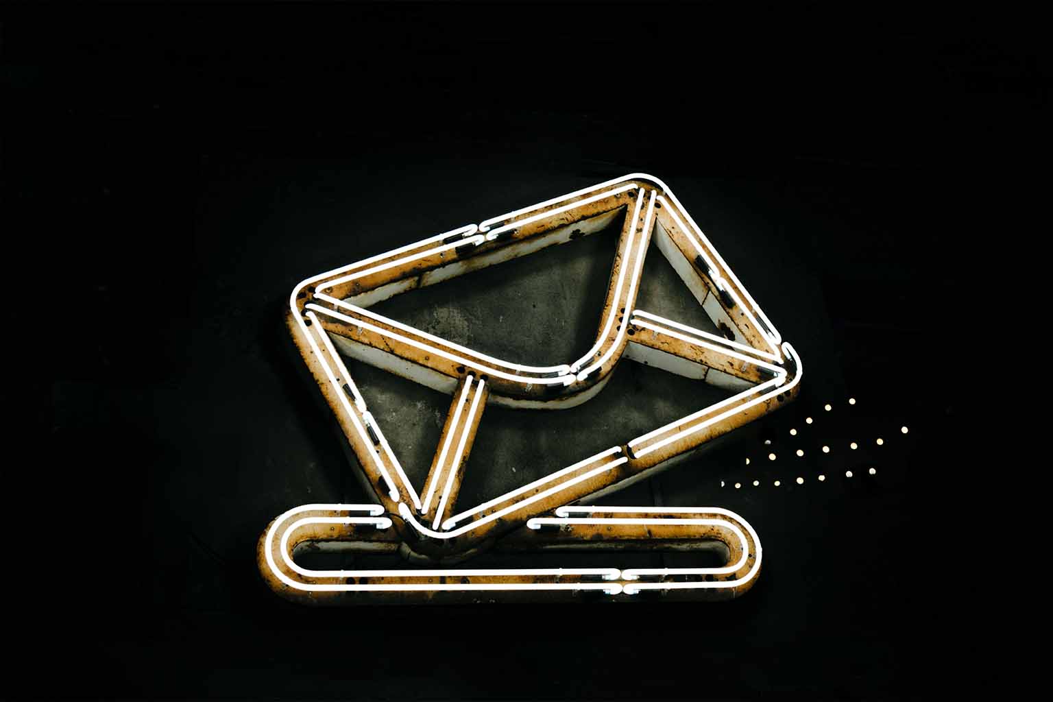 A neon sign shaped as an envelope icon