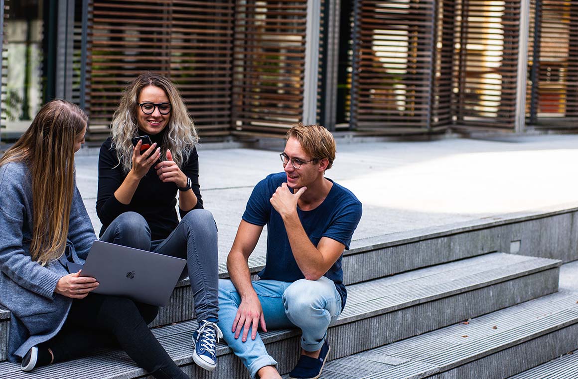 Students chatting on stairs