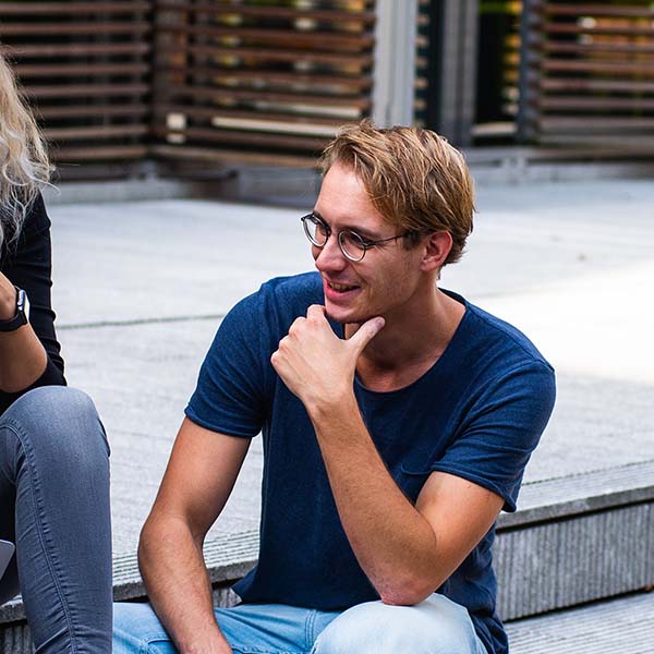 Students chatting on stairs