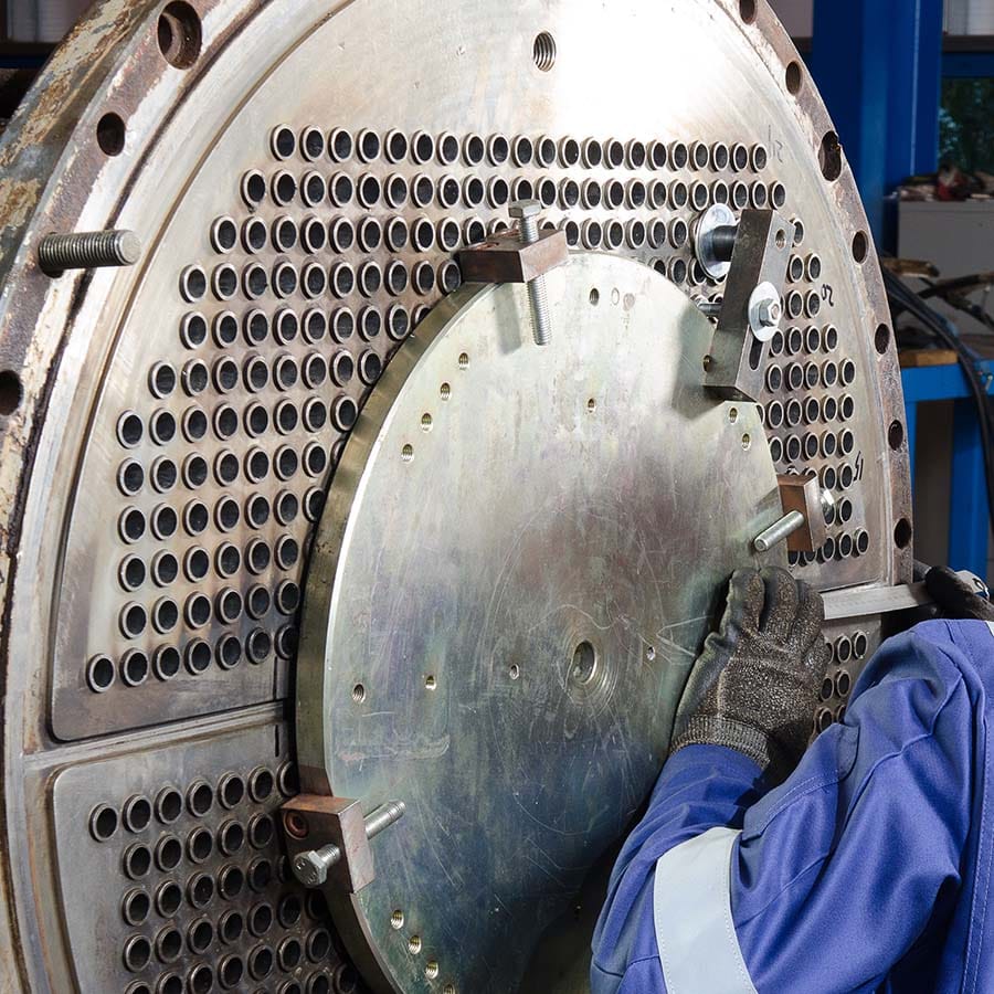 Glacier worker at machinery